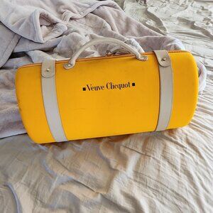 Veuve Clicquot carier with champagne glasses.